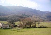 View from the village – the land for sale with the house is half-way up the mountain